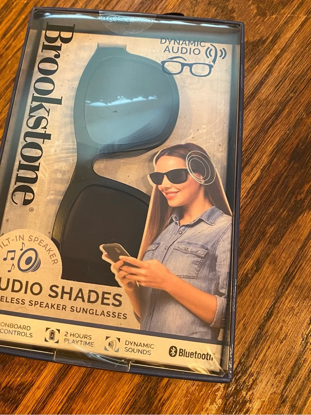 Brookstone Portable Power Dynamic Audio Sunglasses in Black and Blue
